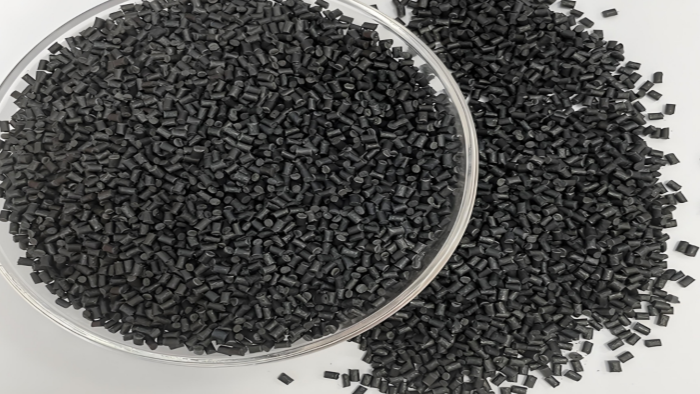 What is the purpose of adding glass fiber to nylon?